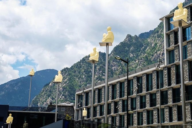 Andorra Private Tour: Sightseeing, Shopping & Traditional Lunch - The Andorra passport stamp and architecture you can point to
