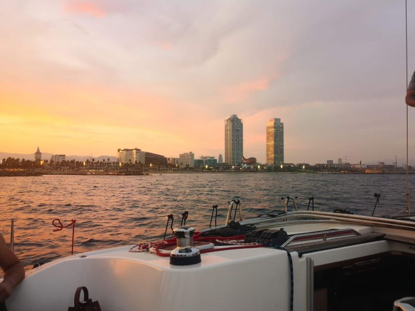 Barcelona: 2-Hour Sunset Sailboat Trip - The skyline from water level: Sagrada Familia, Tibidabo, and more