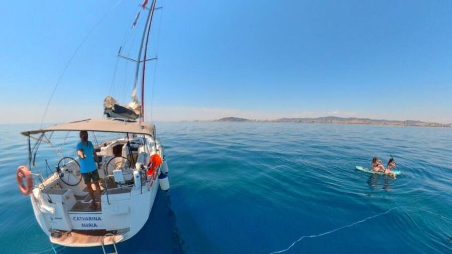 Barcelona: 2-Hour Sunset Sailboat Trip - Swim time, paddle board fun, and the floating-toy factor