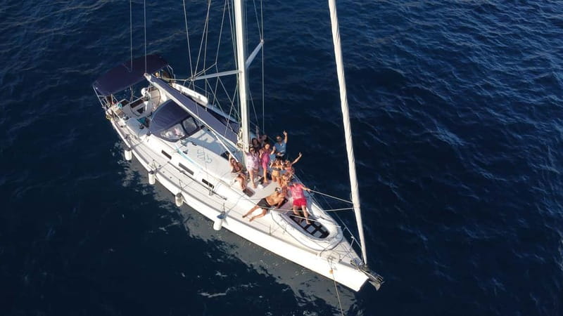 Barcelona 2h private sailing tour with local Skipper - Entering Port Olímpic, meeting Moll de la Marina where boats live