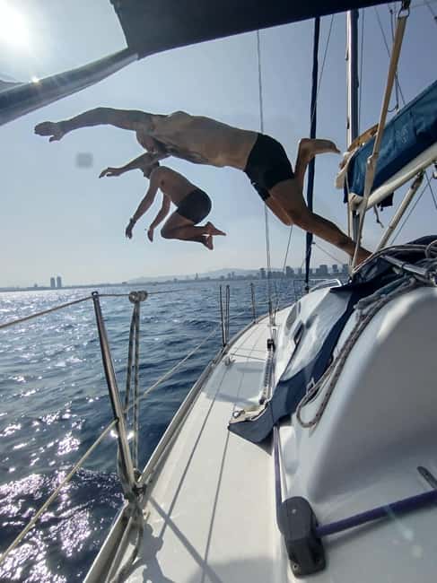 Barcelona Badalona : Sailboat Tour, Snacks, Drinks, Swimming - What You Actually Get: Snacks, Drinks, Music, Gear