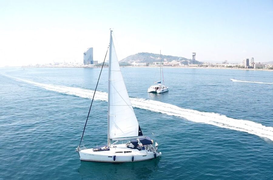 Barcelona: Boat trip with cava in amazing sailboat - Swimming in crystal-clear water, with the Badalona beach option