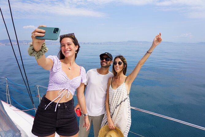 Barcelona Catamaran Cruise with Tapa & Drink Included - Swimming, Inflatables, and the Real Weather Factor