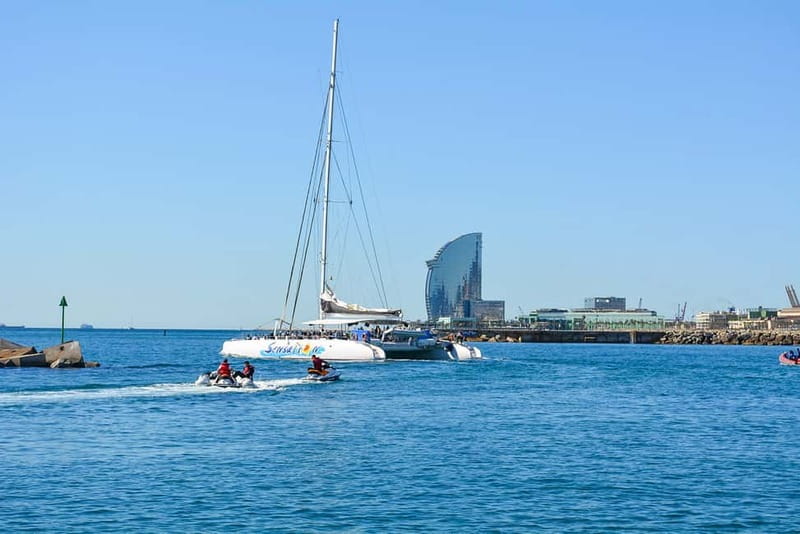 Barcelona: Catamaran Party Cruise with BBQ Meal - Dancing back to Port Olímpic: the host energy is the real show