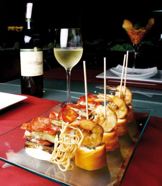 Barcelona: Evening Walking Tour in the Gaudi Area with Tapas - Stop 3 and 4: Mediterranean tapas at cozy places