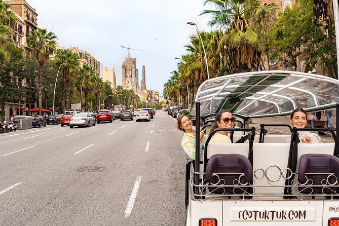 Barcelona Expert Plus Tour with Local Guide in Eco Tuk Tuk Private - Football, sea breezes, and the hilltop shift: Camp Nou, Montjuïc, and ports