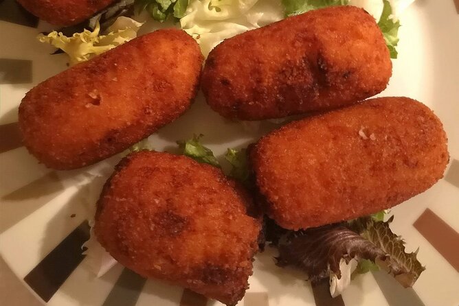 Barcelona Food Tour: Tapas, Drinks and Delights with a Local - Stop 3 on Carrer del Regomir: pan con tomate, pimientos del padron, and cava