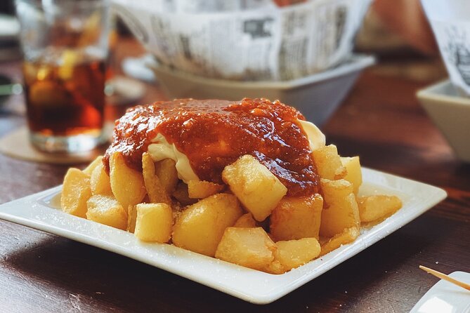 Barcelona Food Tour: Tapas, Drinks and Delights with a Local - Stop 5 at Plaça de Sant Jaume: administrative sights, then dessert heaven