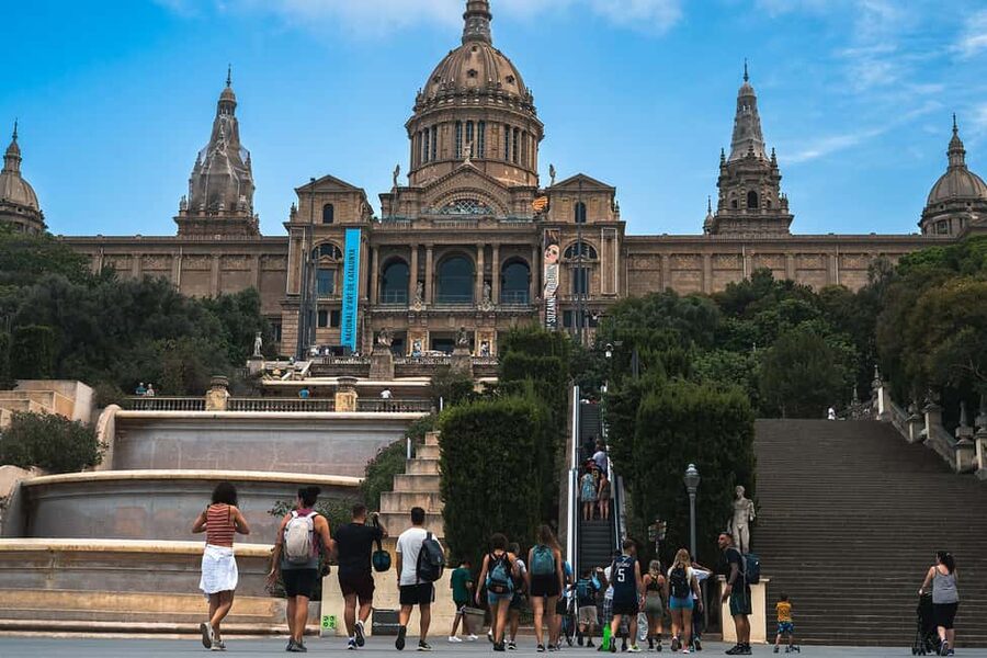 Barcelona from the heights to the sea: Montjuïc, Cable Car, and Beach - Finding the meeting point at Drassanes Pier by Columbus Monument