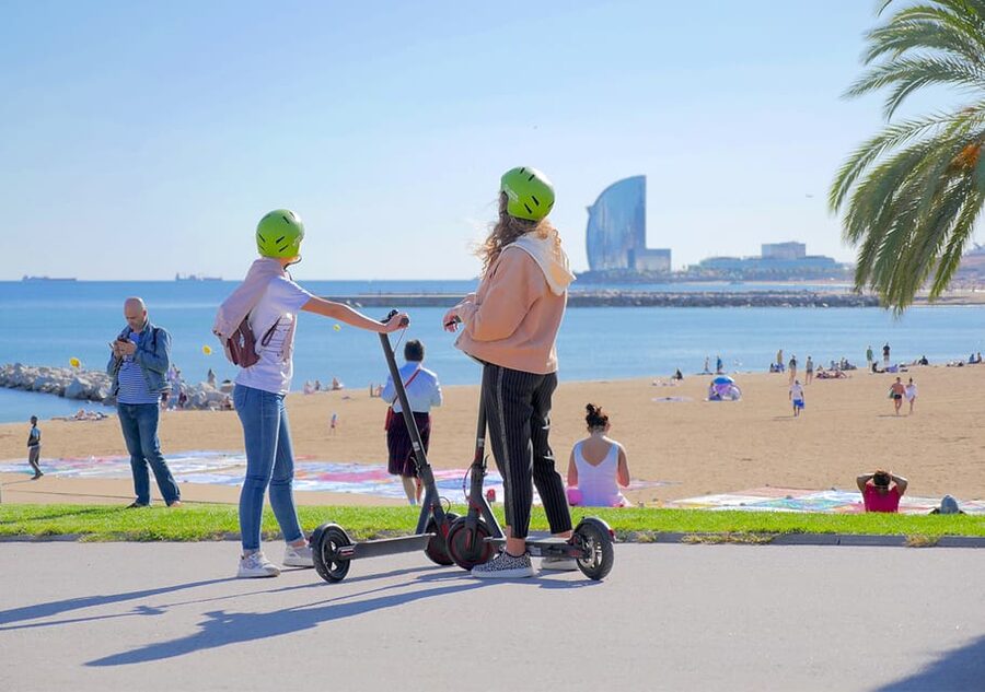 Barcelona: Gaudi Highlights Guided Tour by Electric Scooter - La Monumental and the Eixample contrast, an arena with a stop-and-look pause