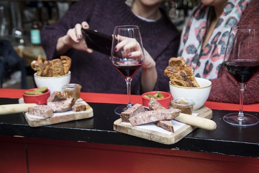 Barcelona Gourmet Food & Wine Tour with Local Expert - Stop 2: A music bar stop where comfort food and Catalan energy meet