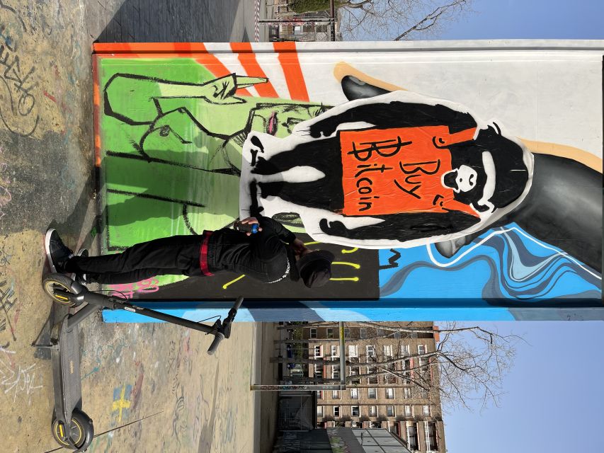 Barcelona: Graffiti E-Scooter Tour - Entering the Robot City rhythm before you move