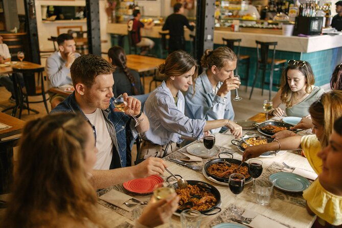 Barcelona: Guided Food Walking Tour with Tapas and Wine - Stop 3: A Bodega Since 1945, Sailor-Style Tastes and the Porrón
