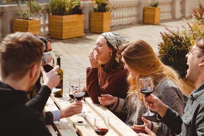 Barcelona: Guided Rooftop Wine Tasting – Enjoy 6 Spanish Wines - Rooftop reality check: hostel setting, great views, and a social atmosphere