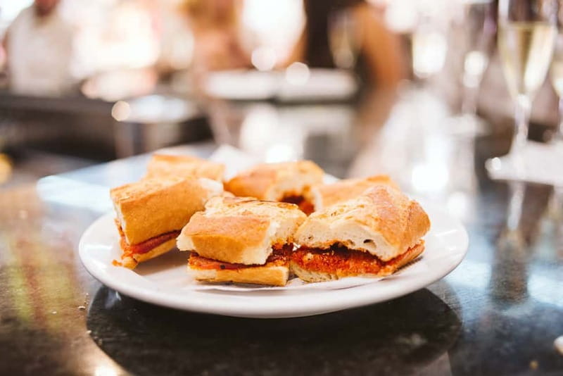 Barcelona: Hidden Markets, Tapas & Paella Food Tour - Brunells and Torrons i dolços La Campana: specialty shopping with story