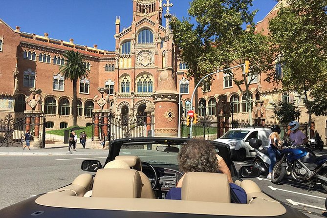 Barcelona in a Convertible - Private Guided Tour - The Saint George-inspired Gaudi building and the Block of Dischord