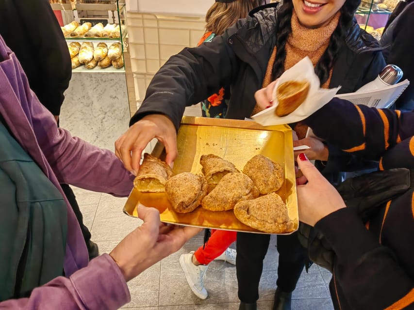 Barcelona: Local Market & Street Food Walking Tour - Street food tastings: jamón, pinchos, pastries, and seasonal treats
