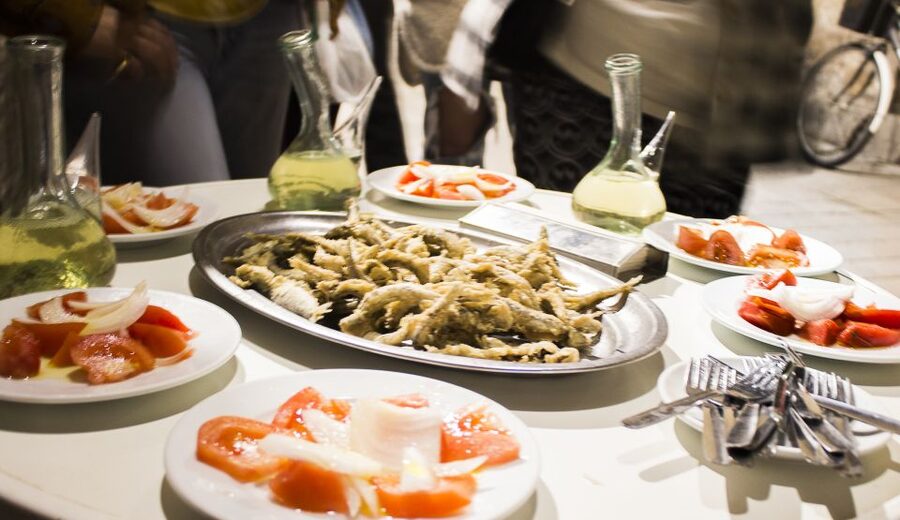 Barcelona: Market, Tasty Tapas/Food and Gothic History Tour - Catalan classics: botifarra, pa amb tomàquet, and pescaditos