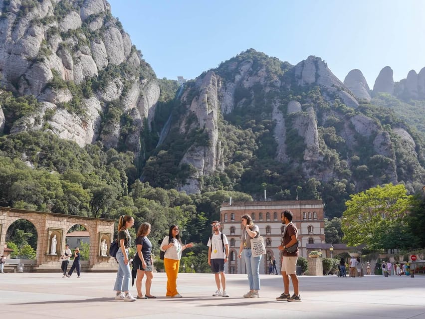 Barcelona: Montserrat Tour with Cog-Wheel & Black Madonna - The monastery guided tour: monks, architecture, and Santa Cova