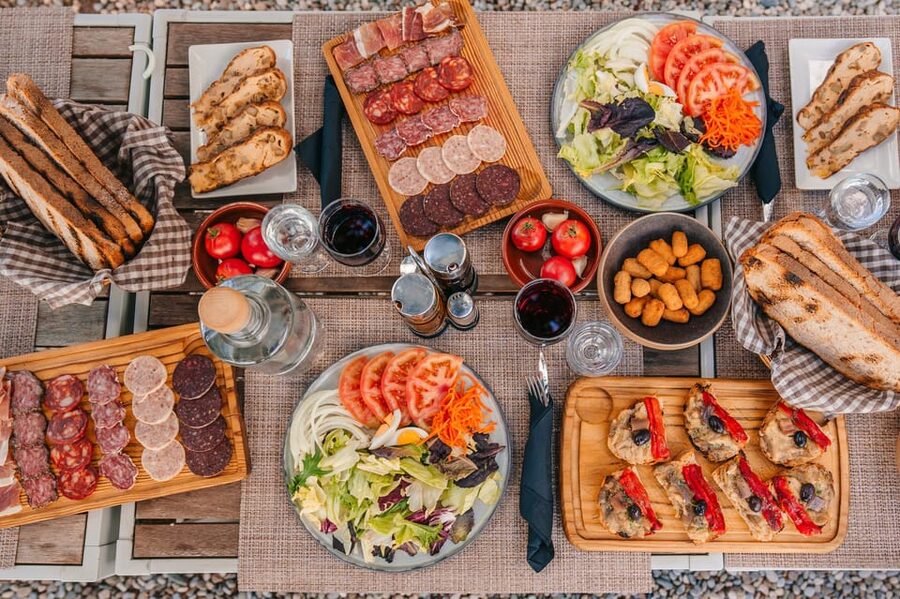 Barcelona: Montserrat Visit & Lunch at Farmhouse Small Group - Lunch at the Farmhouse Under Montserrat: Food With a View and Drinks Included