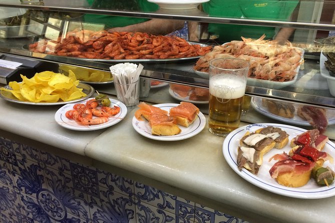 Barcelona Morning Tapas Crawl by Food Tour - Your first stop: Pl. de Catalunya and a walkable game plan