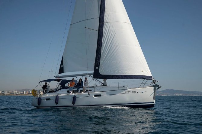 Barcelona Private Sailing Trip with unlimited drinks and snacks - Montgat Beach snorkeling: clear water and a laid-back swim moment