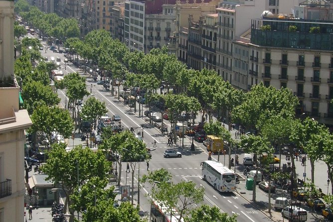 Barcelona Private Walking Tour with Skip the Line La Pedrera and Casa Batllo - La Rambla, if time permits: shops and people, without the lecture