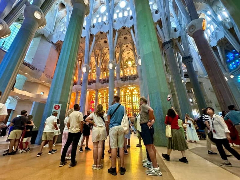 Barcelona: Sagrada Familia, La Pedrera & Cava Tasting Tour - Casa Mila inside: apartments, stone curves, and iron balconies