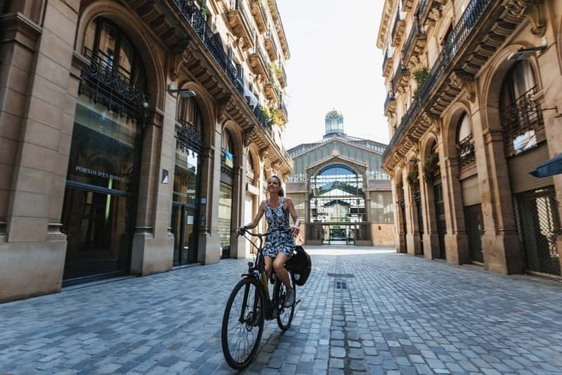 Barcelona: Sagrada Familia or Coastal City Sights by eBike - Eixample architecture close-up: Casa Mila and Casa Batlló