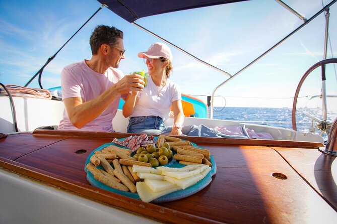 Barcelona Sailing Experience: Spanish Tapas and Premium Open Bar - Swim time depends on the sea, so pack like a planner
