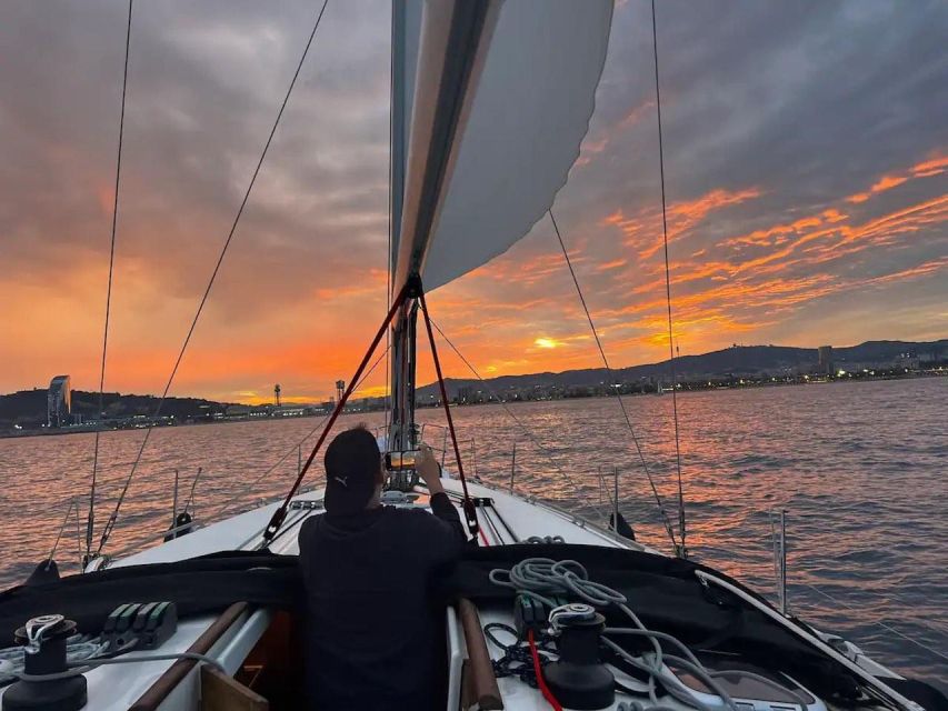 Barcelona: Sailing Tour with a Glass of Cava - Hoisting sails and sailing toward the November buoy