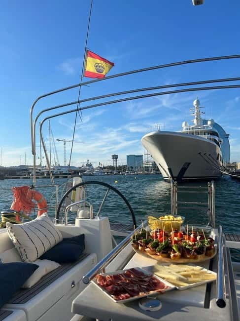Barcelona: Sailing Tour with Tapas, Drinks and Swim Stop - Your first 20 minutes: safety demo, then settle in