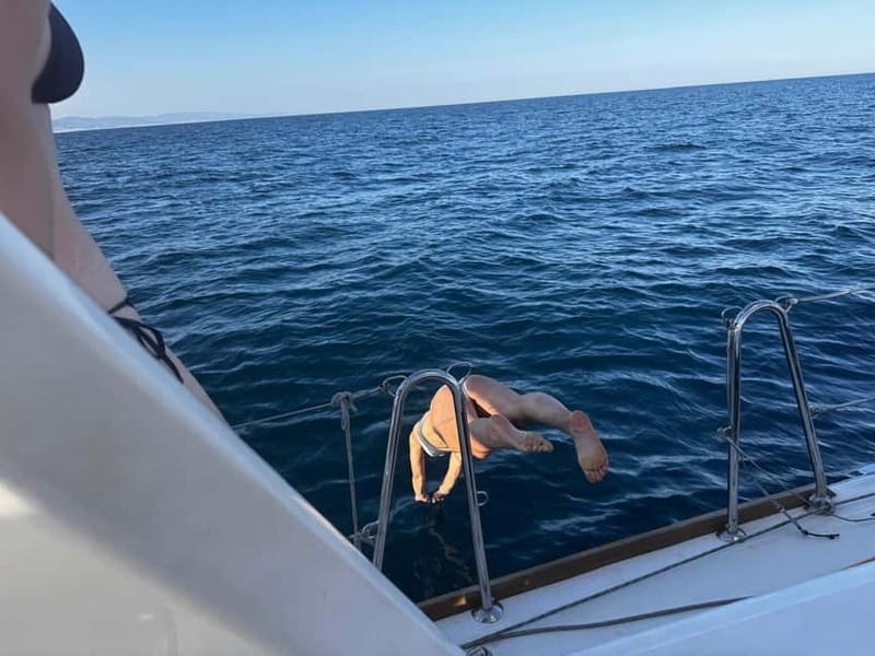 Barcelona: Sailing Tour with Tapas, Drinks and Swim Stop - Spot the city from the water, including the America’s Cup harbor