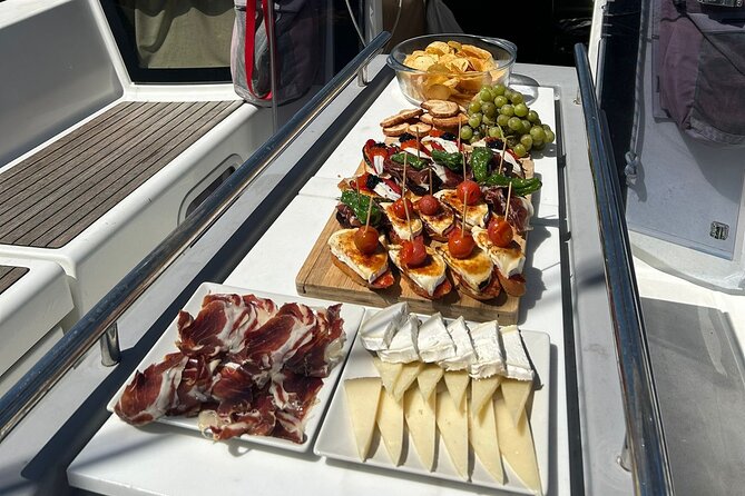 Barcelona: Sailing Tour with Tapas, Drinks, Swim & Sunset Option - Sailing past the 2024 America’s Cup area: the views you can’t get from shore