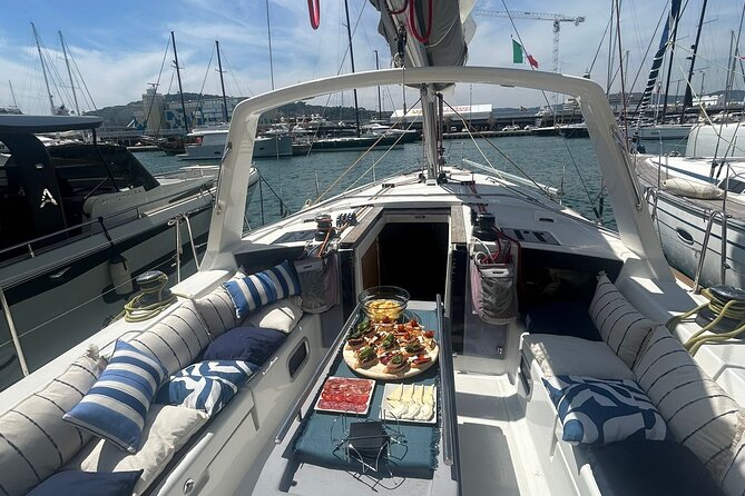 Barcelona: Sailing Tour with Tapas, Drinks, Swim & Sunset Option - Cava and seafood tapas on deck: what you’re really paying for