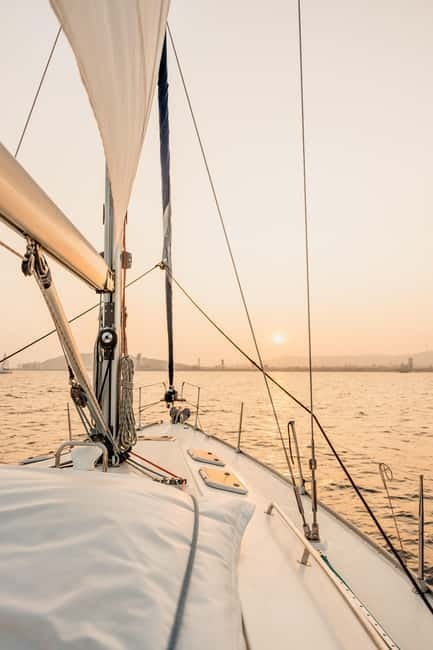 Barcelona: Sailing Tour with Young Local Captain & Drinks - Drinks, snacks, music, and what’s actually included
