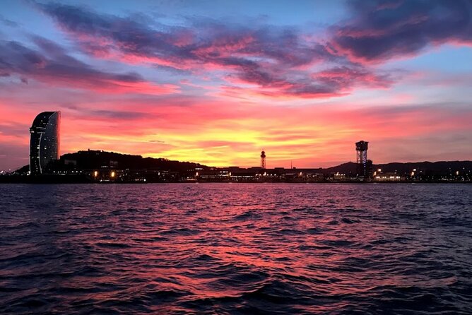 Barcelona Sensational Sunset Tour with Open Bar and Snacks - Port Vell: where the city turned warehouses into a waterfront magnet
