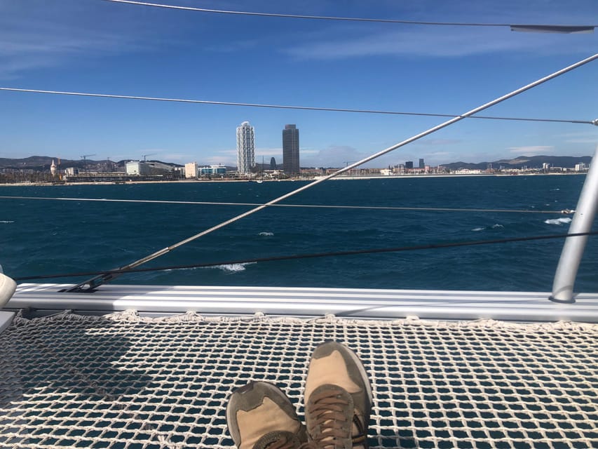 Barcelona: Shared cruise on luxury catamaran Drinks + Snacks - Barcelona icons up close: Hotel W, Sagrada Familia, Forum, and Tibidabo