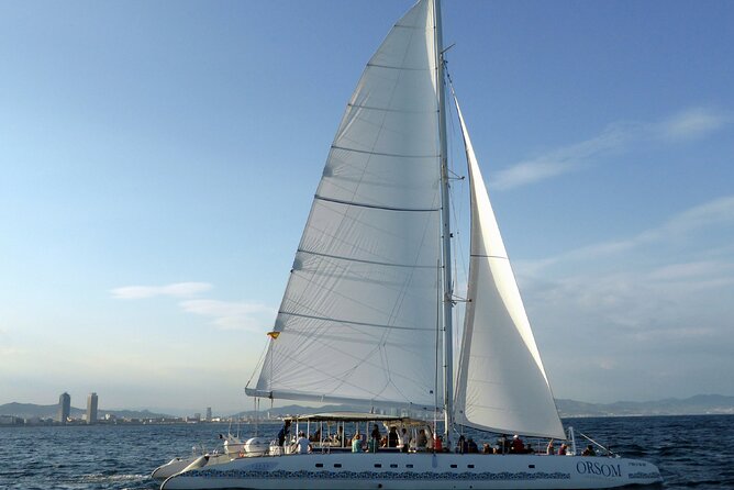 Barcelona Skyline Sailing - Stop on the Water: The Catamaran Orsom Sail Itself