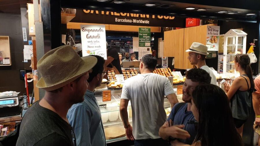 Barcelona: Street Food & Sightseeing Tour with Local Market - The food stops: jamón, patatas bravas, cheese, and more