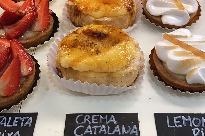 Barcelona Street Food Tour with Local Market & City Center Visit - Plaça del Rei and Roman traces near Palau Reial Major