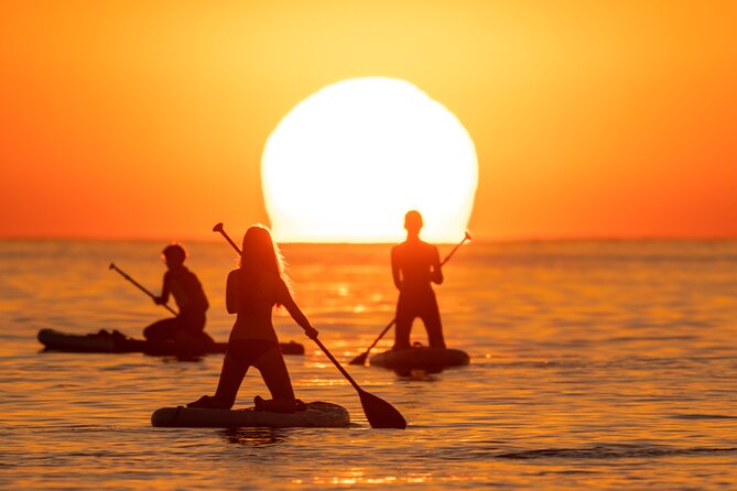 Barcelona: Sunrise Paddle Surf with Instructor and Photos - Included lockers, shower room, and photo coverage that saves your attention