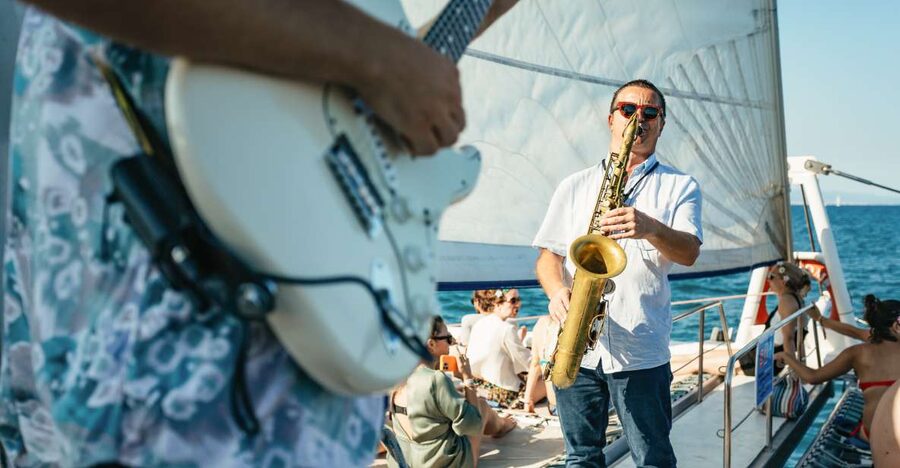 Barcelona: Sunset Catamaran Cruise with Live Music - CATAMARAN ORSOM details: 78 feet of space, nets at sea level-ish