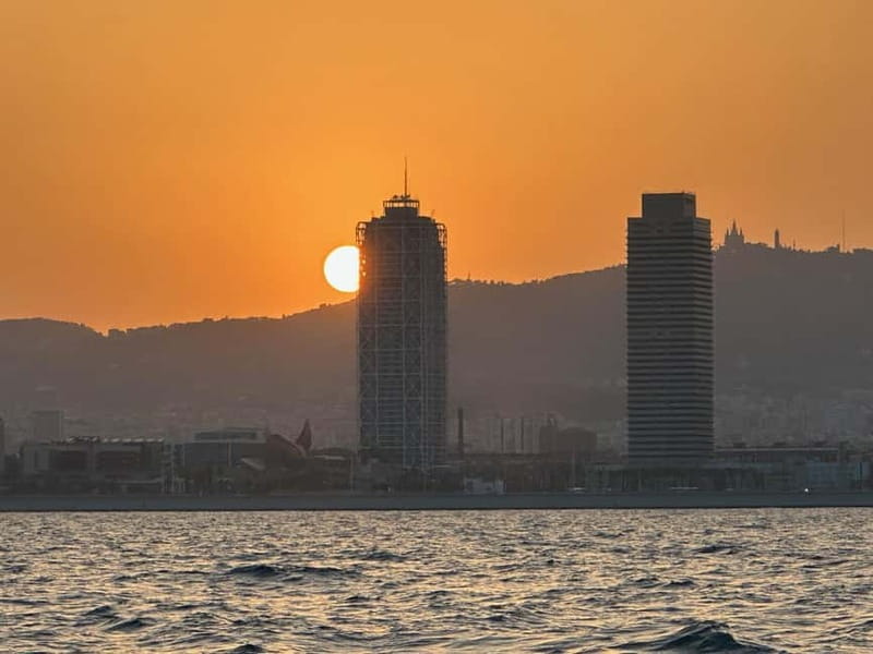 Barcelona: Sunset Sailboat Cruise with Open Bar and Snacks - Open bar of cava, juices, and water, plus snacks on board