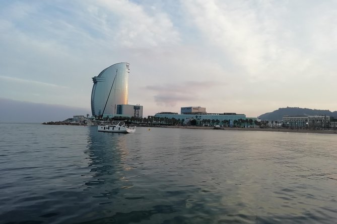 Barcelona Sunset Sailing Cruise from Port Olímpic with Open Bar - Montjuic Fortress from the sea, plus the port’s industrial edge