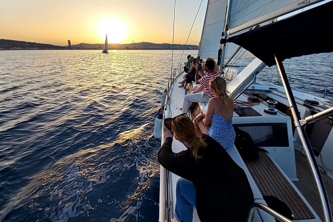 Barcelona Sunset Sailing Cruise from Port Olímpic with Open Bar - Maremagnum on pontoons and the Olympic Towers finale