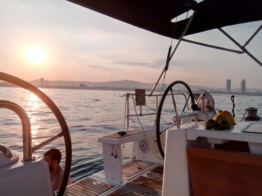 Barcelona: Sunset Sailing Tour with Open Bar & Snacks - Open bar comfort: drinks, snacks, and music