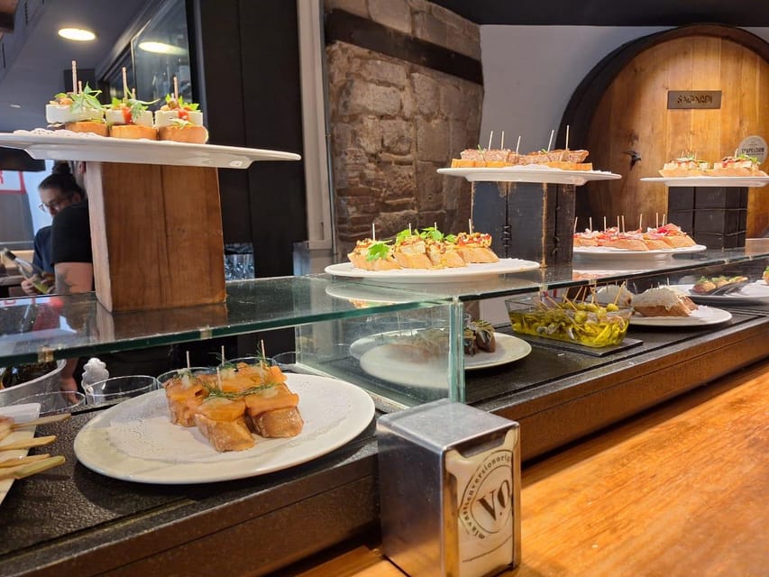 Barcelona: Tapas and Pintxos Tour with Crema Catalana - Key highlights to know before you go