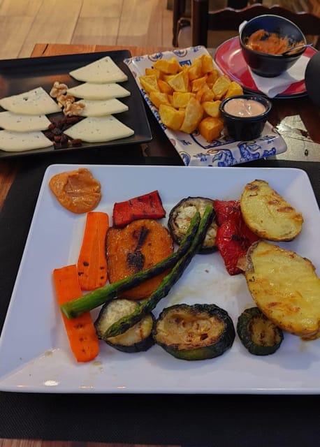 Barcelona: Tapas and Pintxos Tour with Crema Catalana - The savory rounds: patatas bravas, pan con tomate, and croquetas