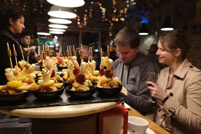 Barcelona: Tapas & Wine, Private Tour in Traditional Taverns - Where you start: El Molino and the quick path to local bars